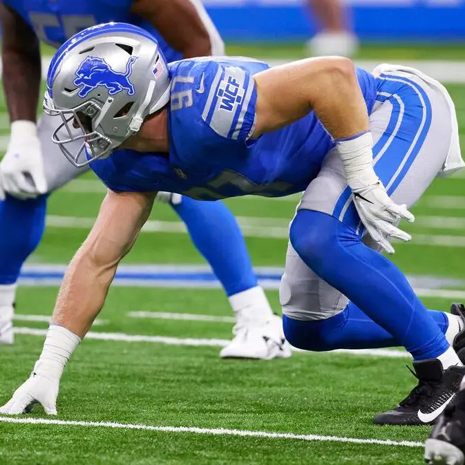 detroit lions defensive end Aidan-Hutchinson is shown during a game.