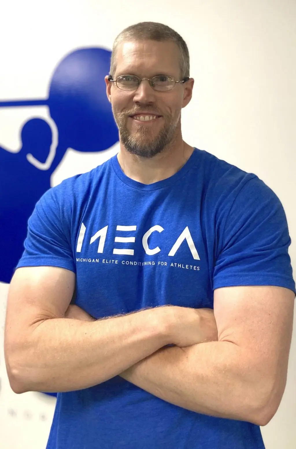 An headshot image of john who is a training coach at MECA.