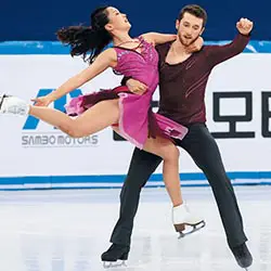 Yura Minn perform a dance routine in the ice dance competition.