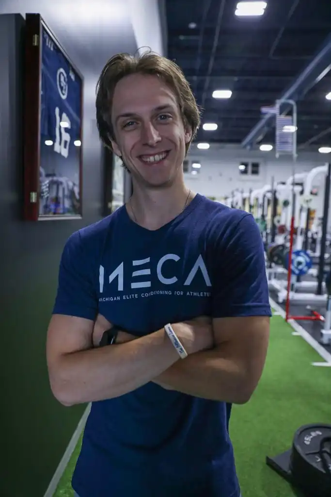 a personal trainer's headshot at the MECA gym.