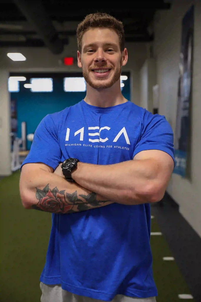 A headshot image of Mike taken at MECA gym.