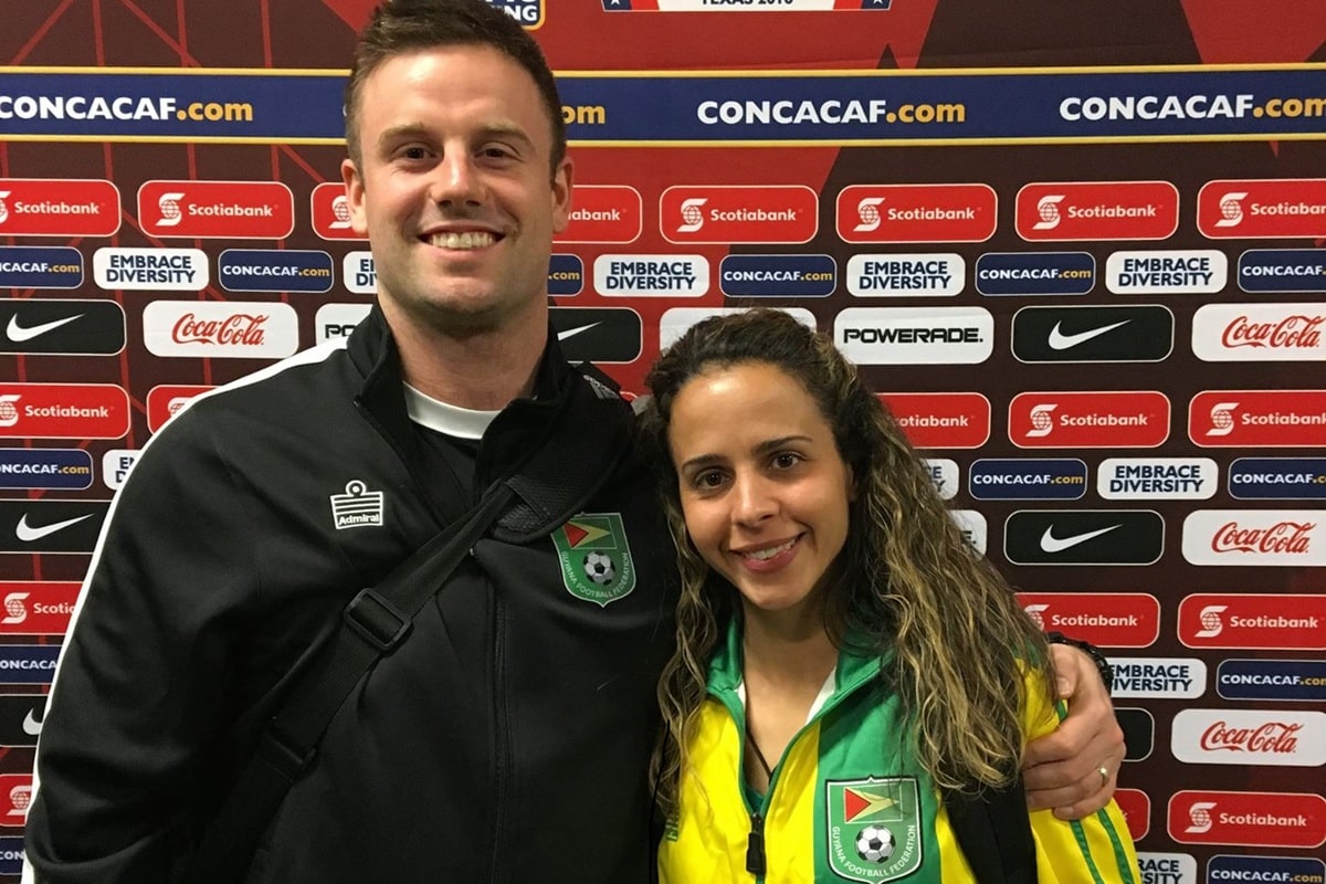 David Lawrence with Guyana Female Soccer Player