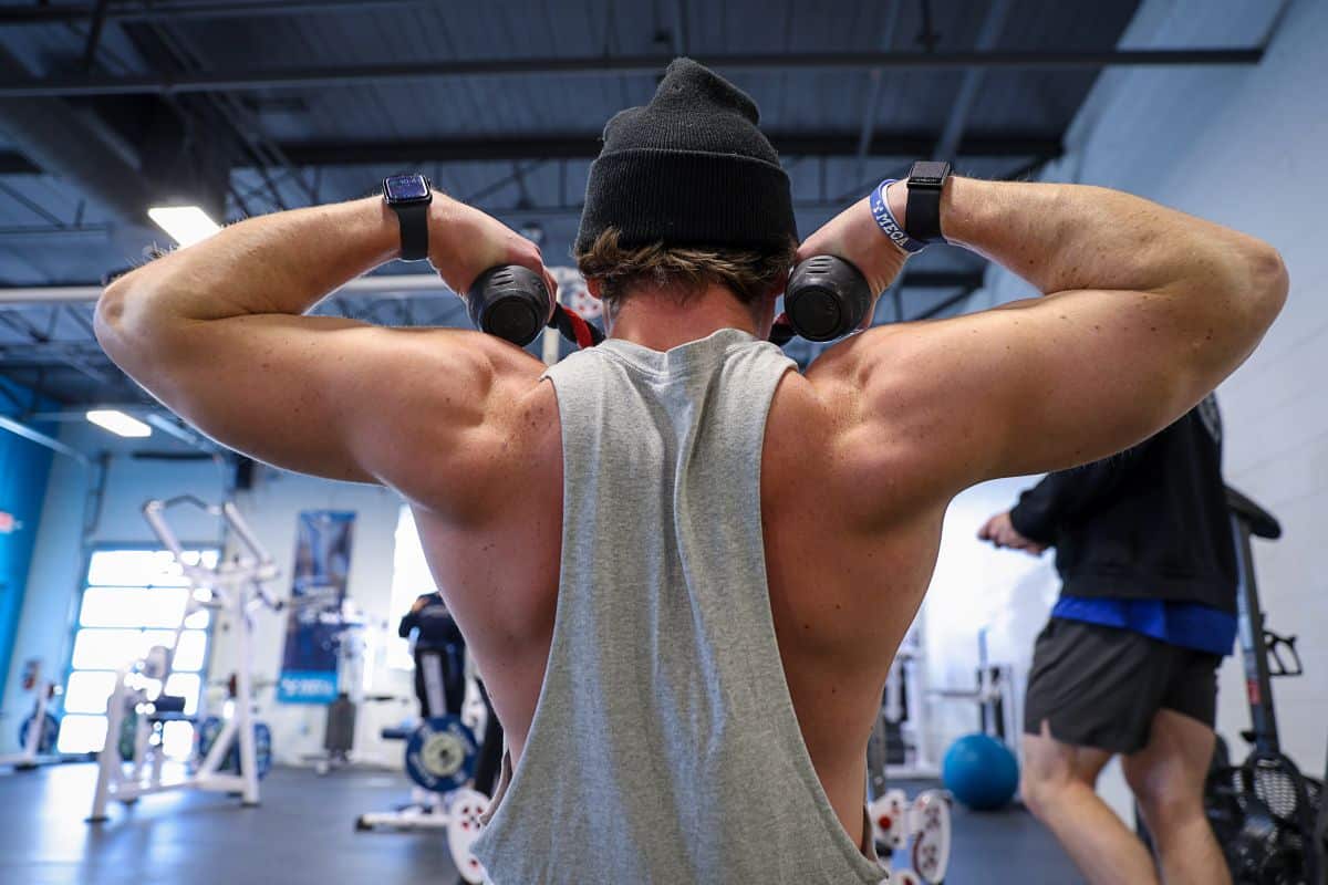 Athlete strength training showing muscular back