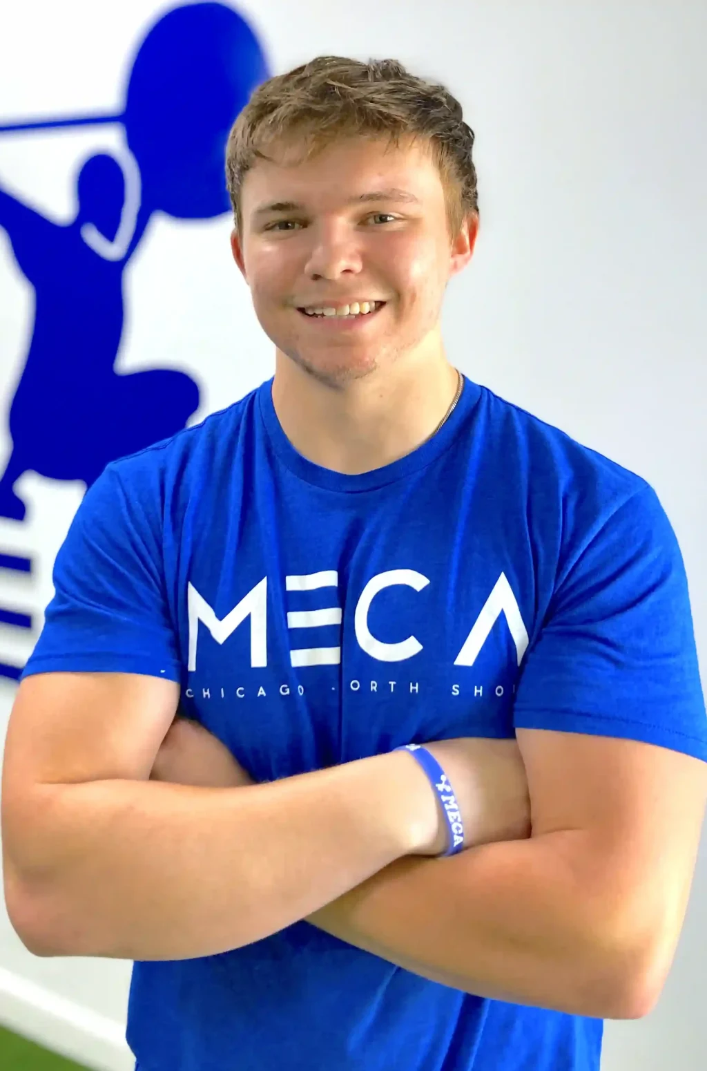 A headshot image of Cade taken at MECA gym.